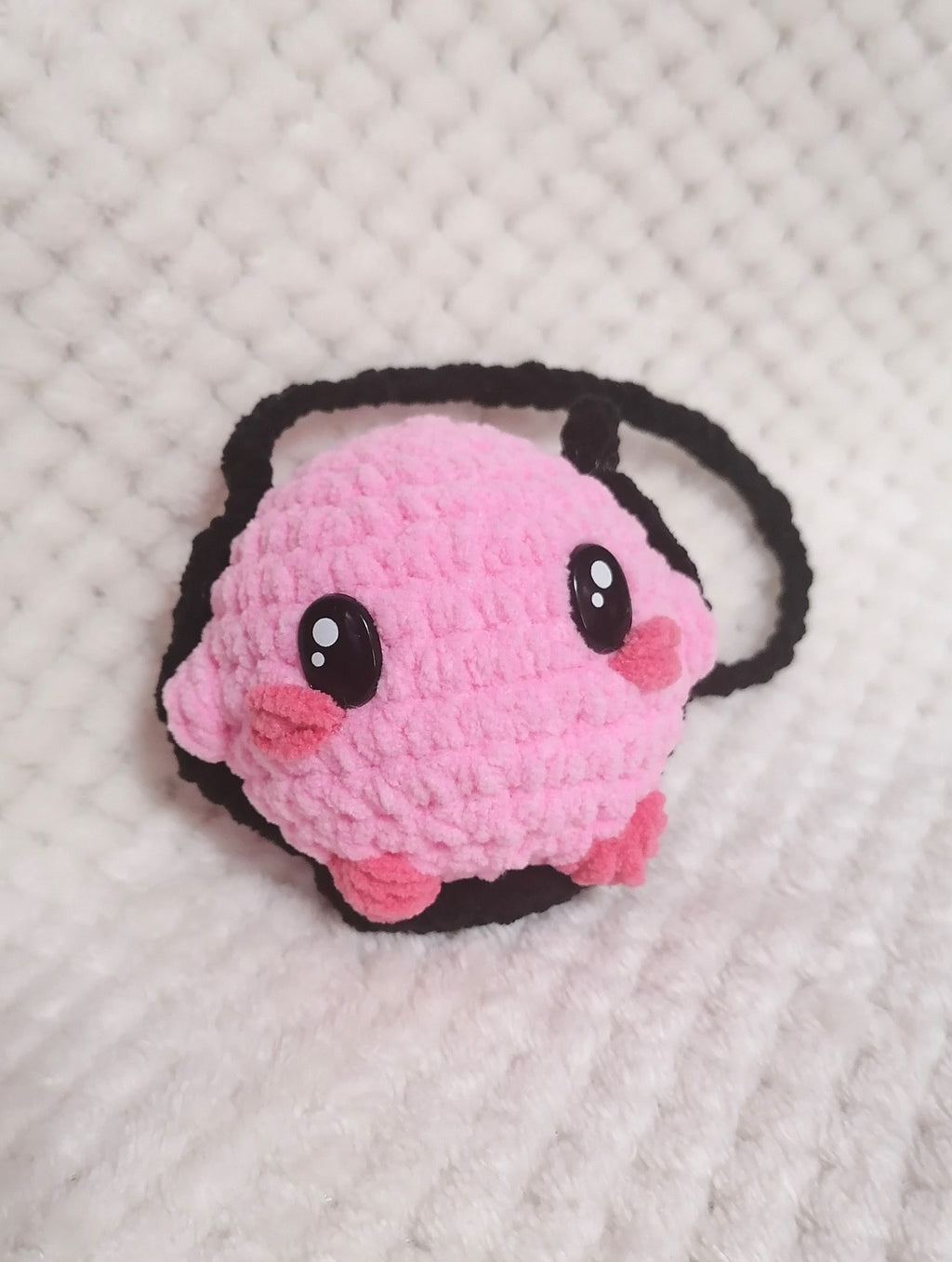 Kirby sur balançoire