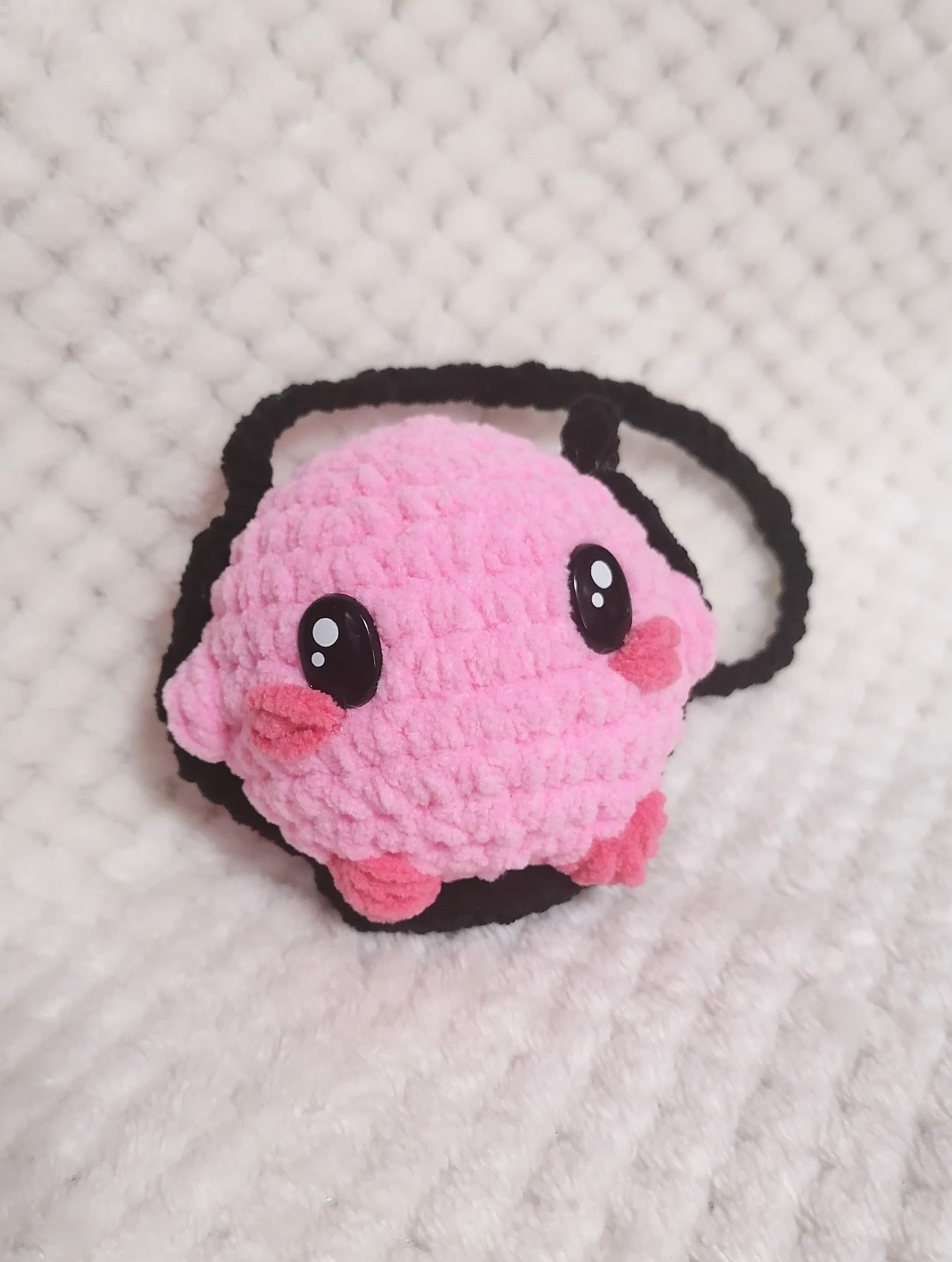 Kirby sur balançoire