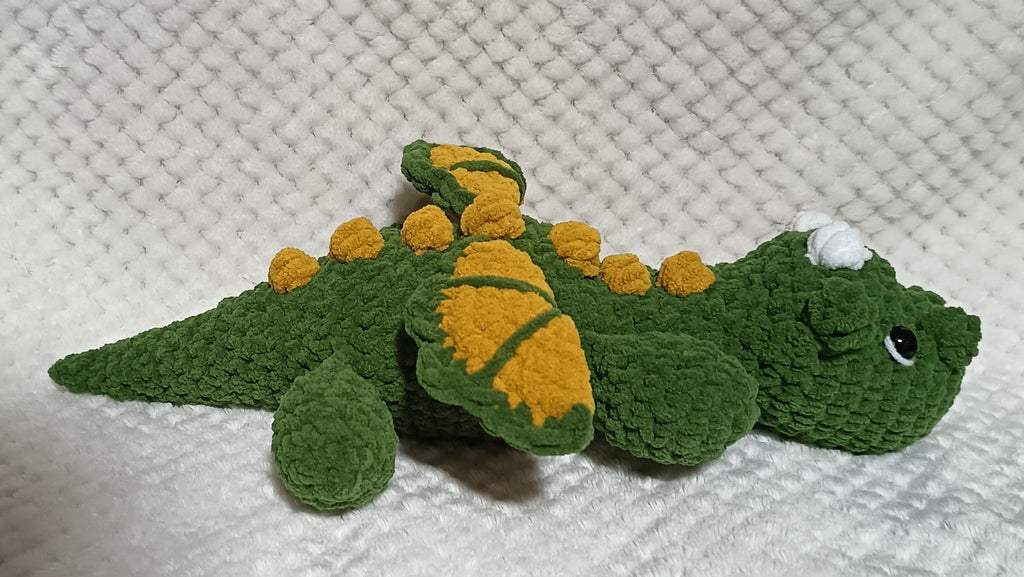 Bébé Dragon allongé