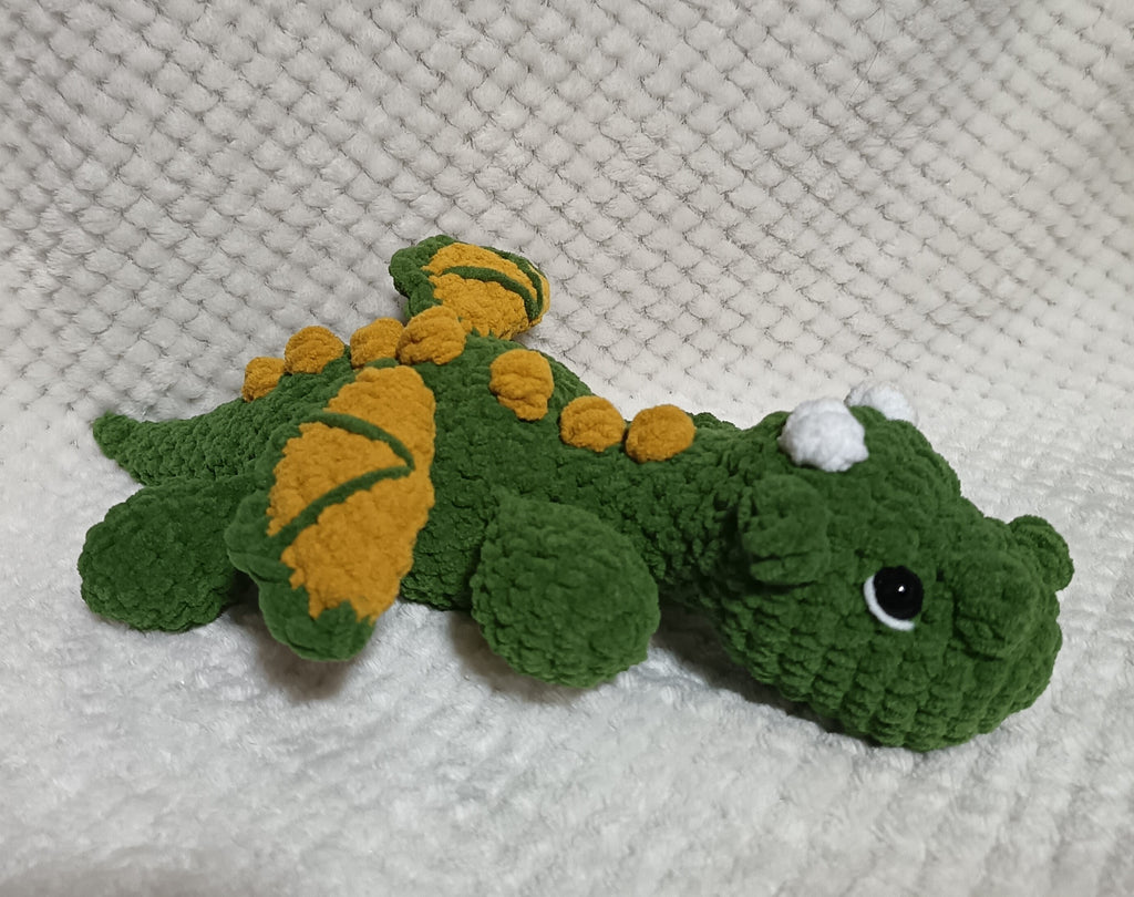 Bébé Dragon allongé