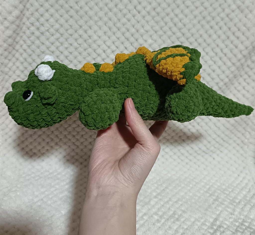 Bébé Dragon allongé