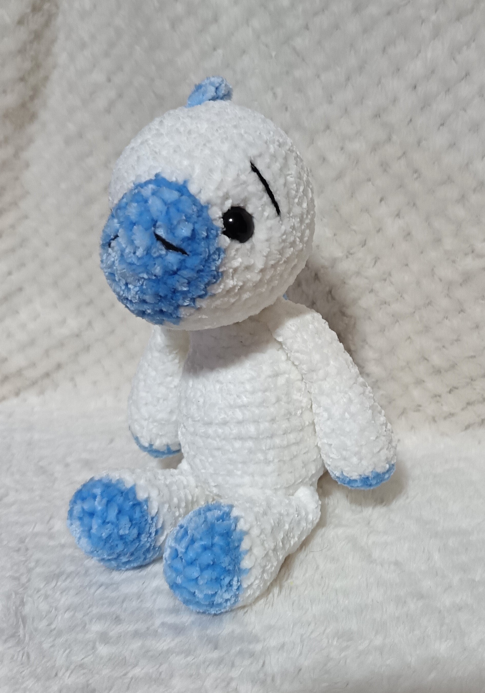 Doudou dinosaure chenille blanc et bleu ciel