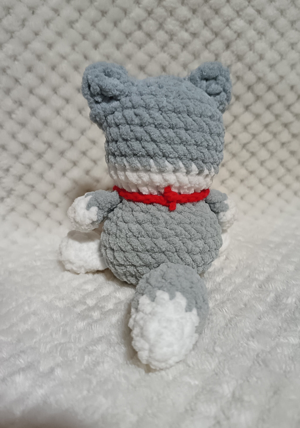 Husky avec collier os