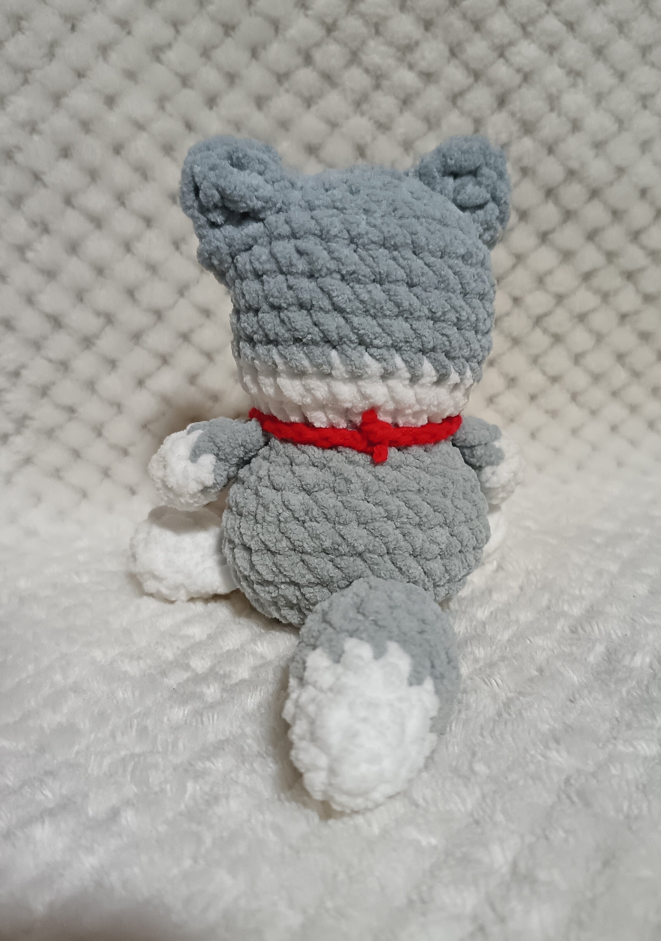 Husky avec collier os