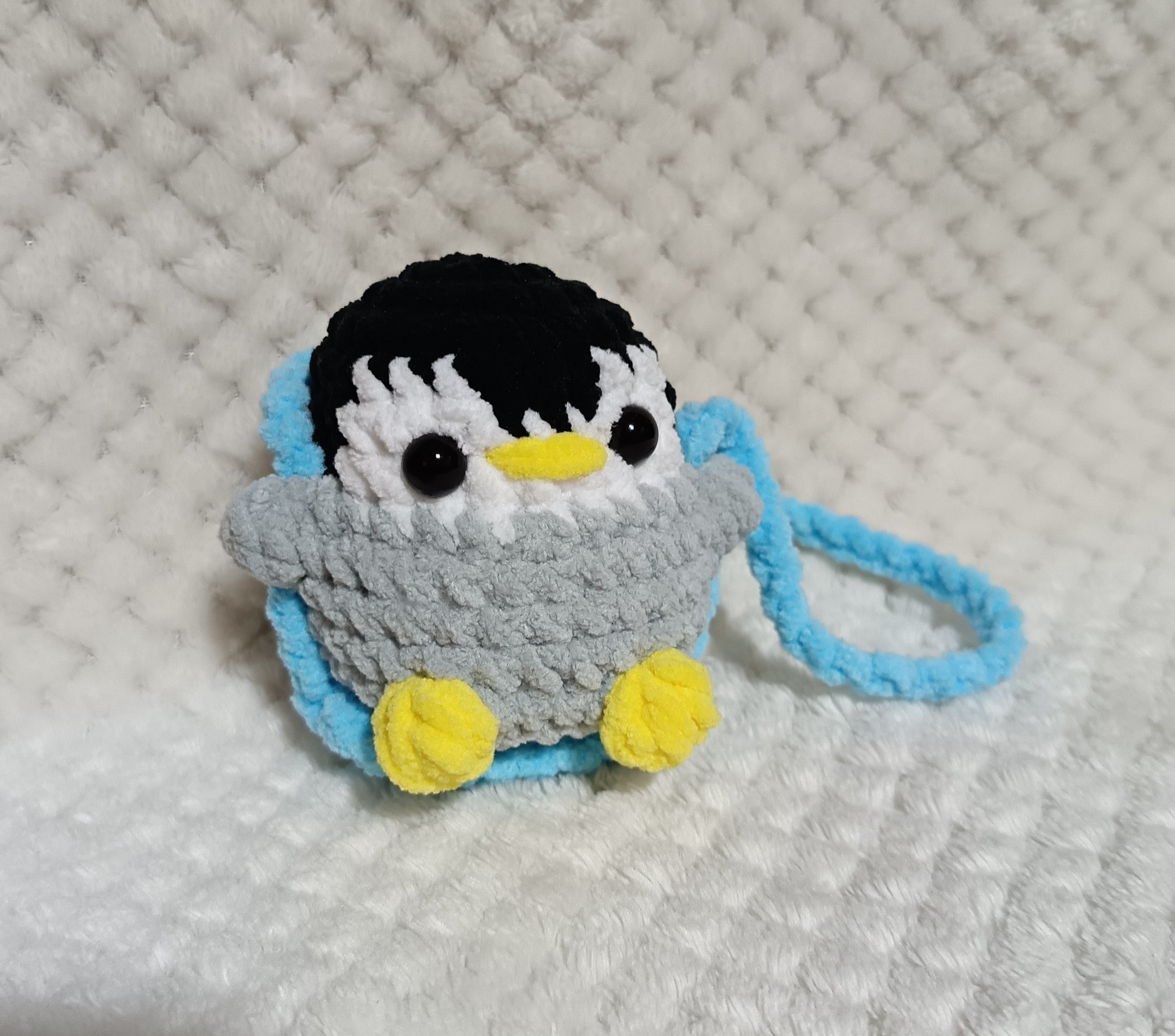 Pingouin sur balançoire