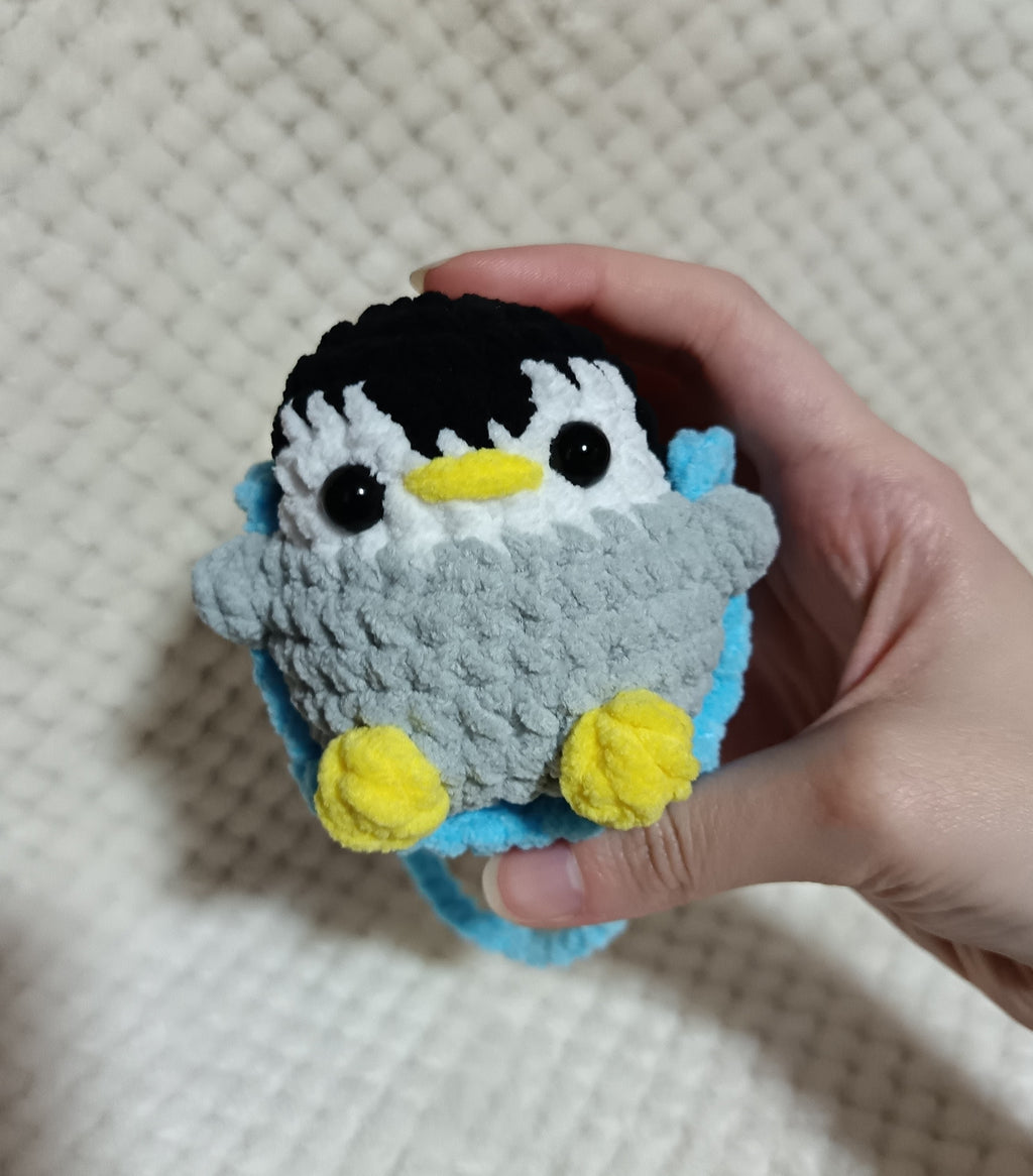 Pingouin sur balançoire