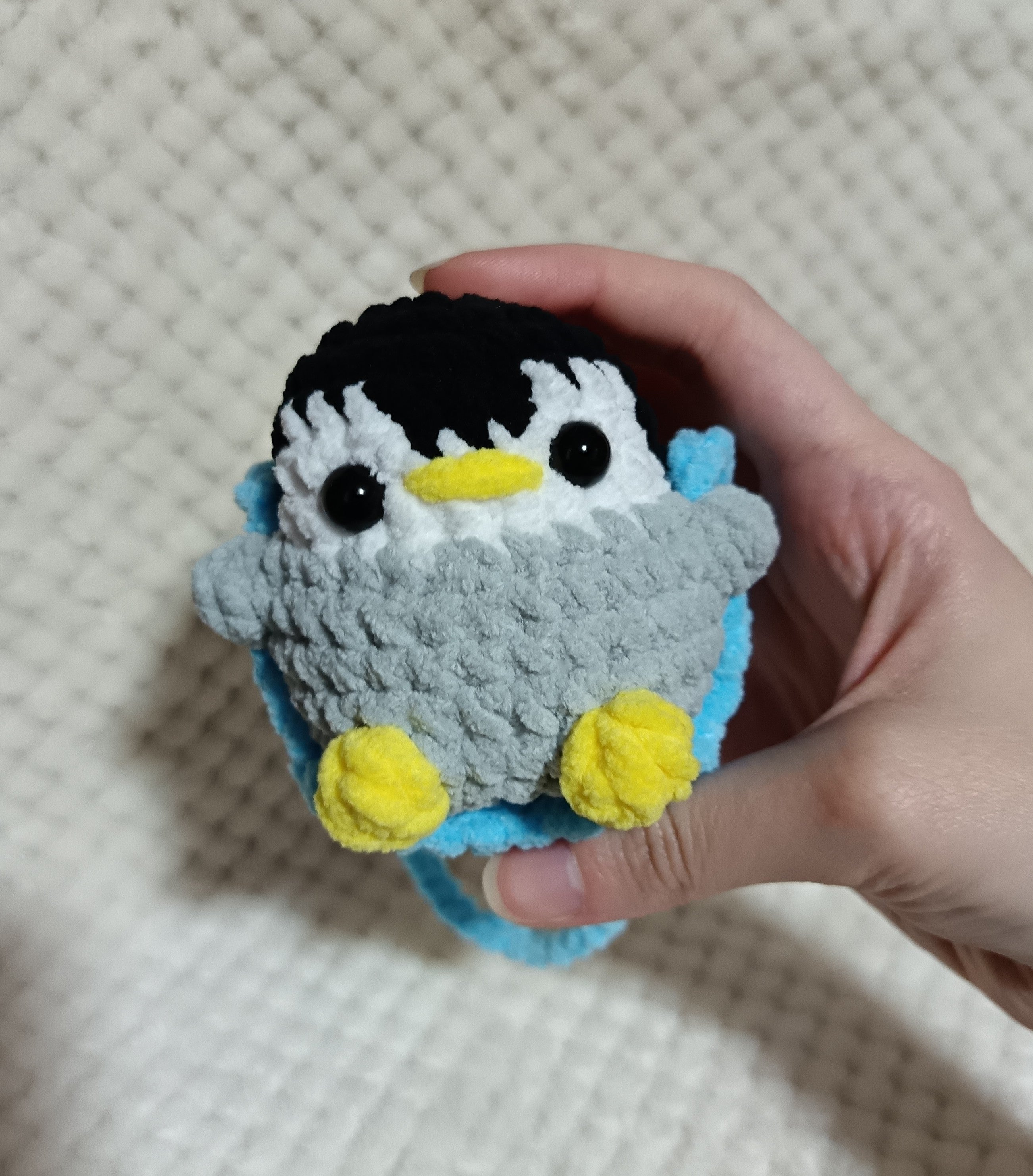 Pingouin sur balançoire